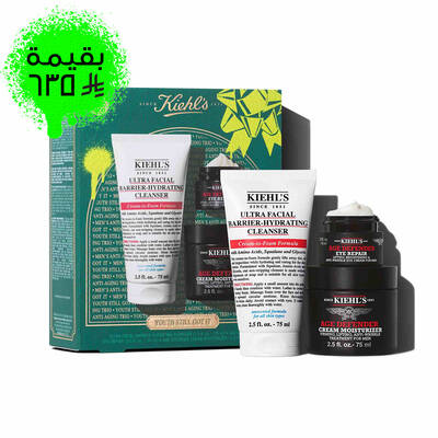 A graphic set against a dark green textured background with bright green accents features three Kiehl’s products and a gift box. On the left is a white tube of "KIEHL’S ULTRA FACIAL BARRIER-HYDRATING CLEANSER" labeled "TRAVEL SIZE." In the center are a black jar of "KIEHL’S AGE DEFENDER CREAM MOISTURIZER" and a black jar of "KIEHL’S AGE DEFENDER EYE REPAIR" with visible cream, both labeled "FULL SIZE." To the right is a boxed Kiehl’s gift set displaying the same three products, decorated with bright green graphic shapes and a bow design."