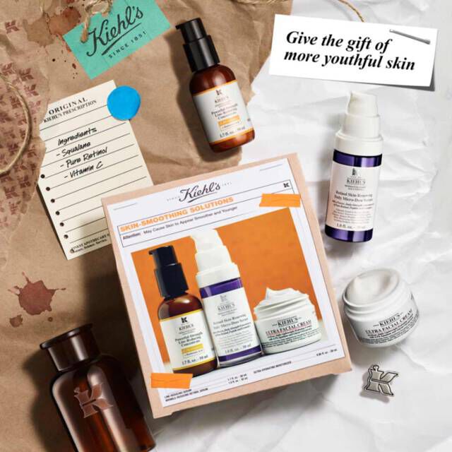 Skin Smoothing Solutions Set Box on top of paper with elements scattered around​