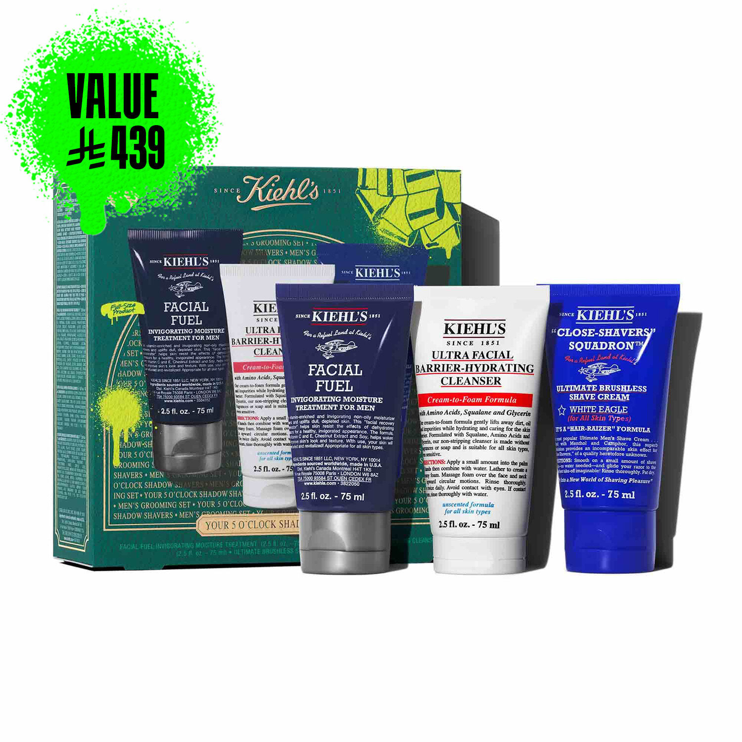A graphic featuring a dark teal Kiehl’s gift box with gold accents on the left. The box contains three products. To the right of the box, the same three products are displayed outside of the box: a dark blue tube of "KIEHL’S FACIAL FUEL MOISTURIZER," a white tube of "KIEHL’S ULTRA FACIAL BARRIER-HYDRATING CLEANSER," and a dark blue tube of "KIEHL’S CLOSE-SHAVERS SQUADRON ULTIMATE BRUSHLESS SHAVE CREAM." The box is decorated with bright green graphic paint splatters and a bow design, and features the text "YOUR 5 O’CLOCK SHADOW SHAPERS" at the bottom.